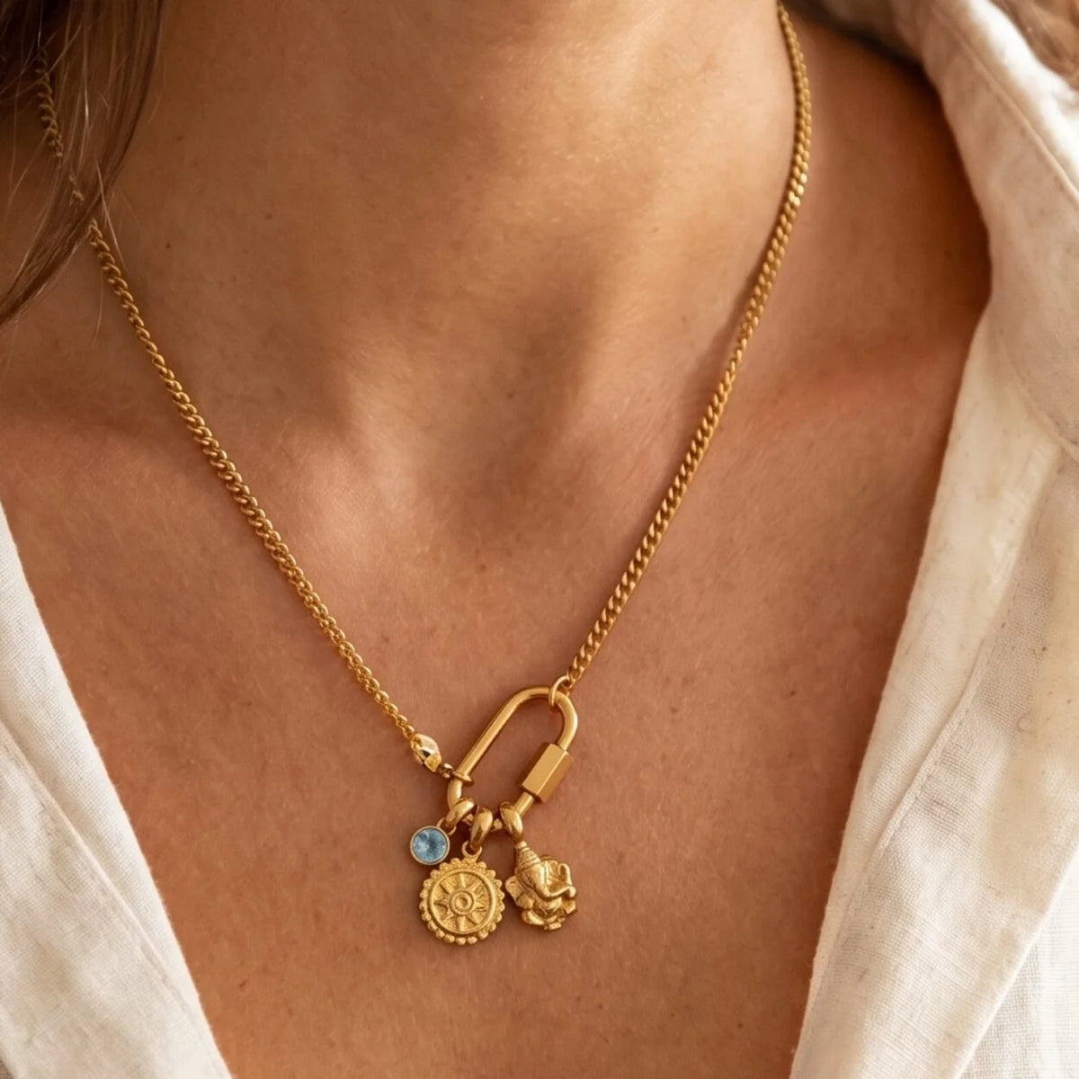 Ganesha Kette aus vergoldetem Edelstahl mit drei Anhängern