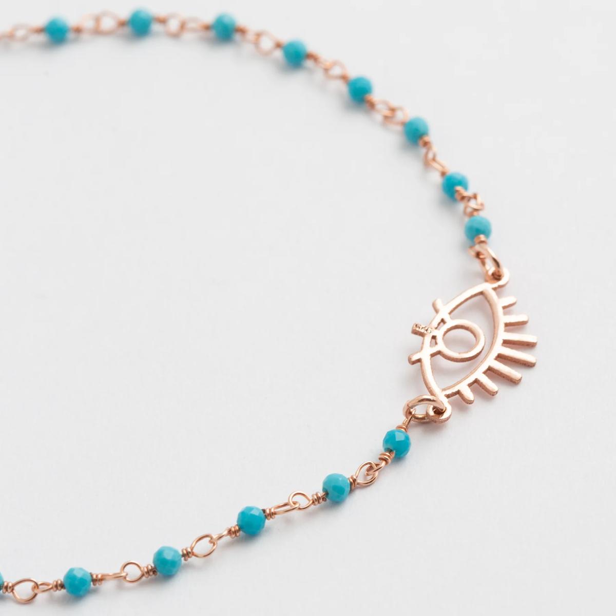 Gottes Auge Armband aus rosegold mit zarten Türkis Perlen Detailansicht