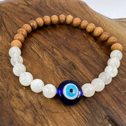 Armband aus Sandelholzperlen, Mondstein und dem Nazar